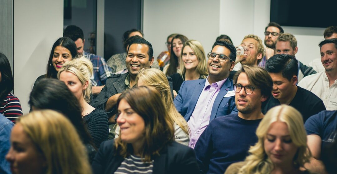 Audience listening attentively at a conference
